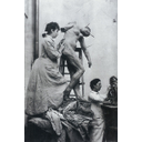 Camille Claudel working in her workshop