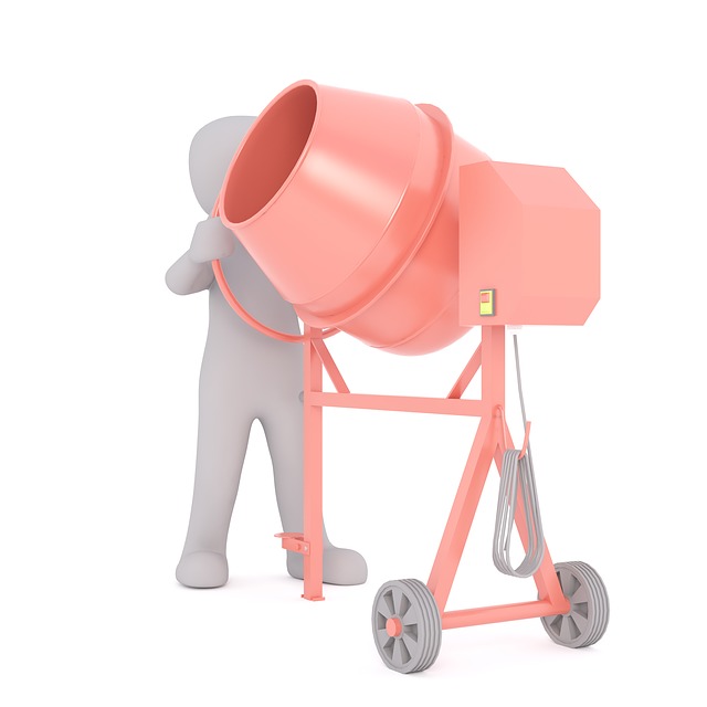 Figura manexando unha formigoneira.