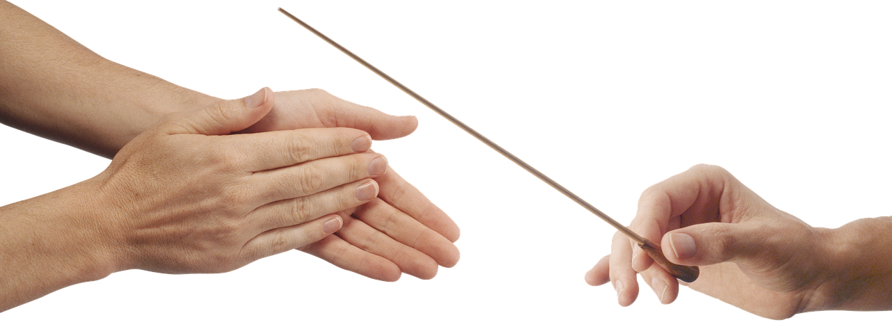 Mans director con batuta