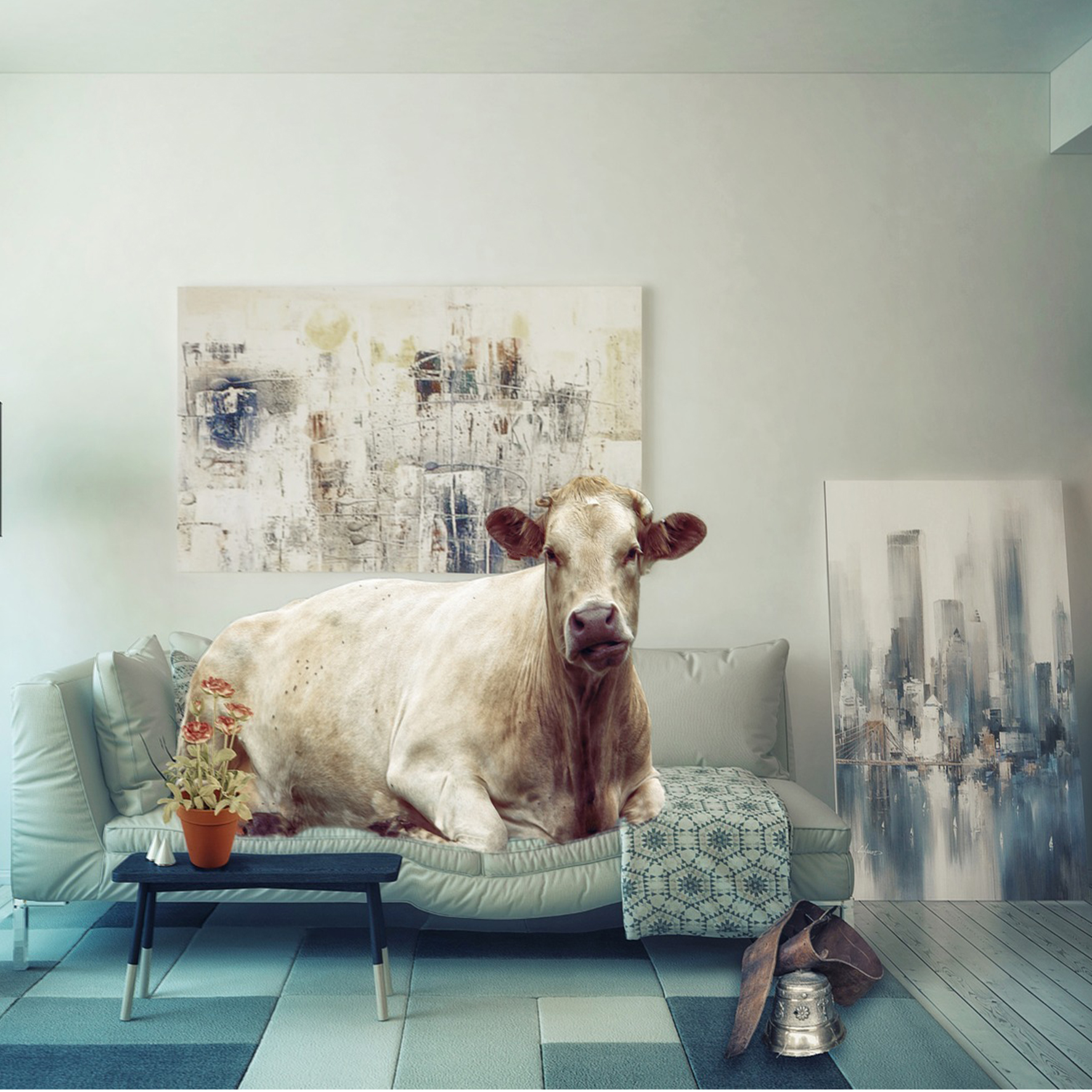 Vaca con arte deitada nun sofá