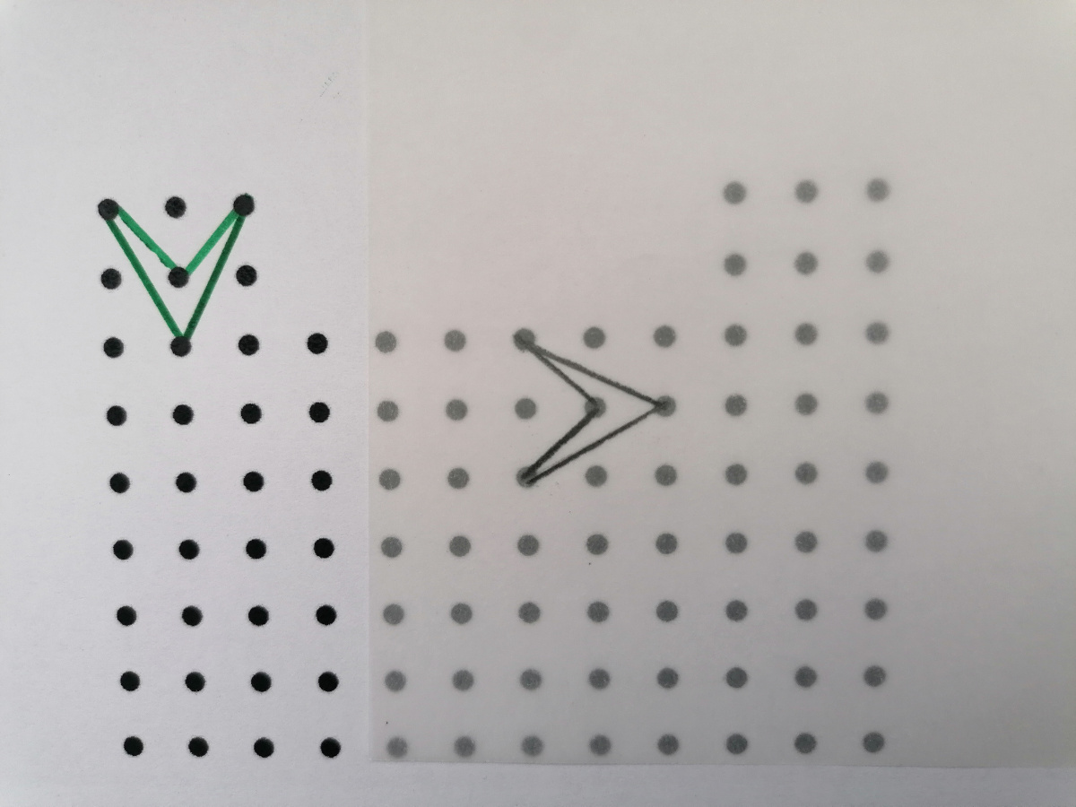 Trama de puntos con papel sobre ella para ejemplificar cómo se calca