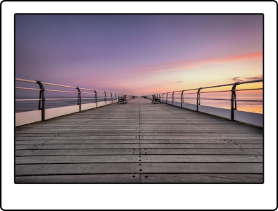 Fotografía dunha pasarena ao anoitecer