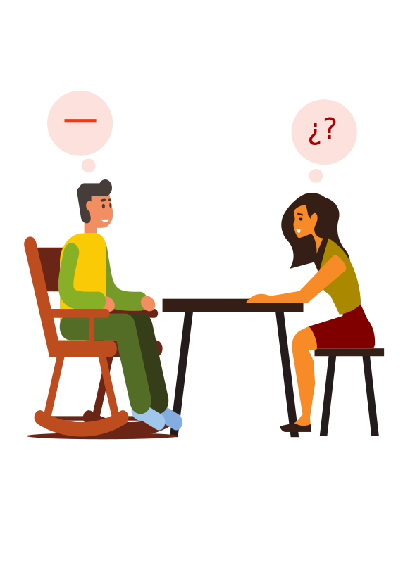 Chico y chica sentados con una mesa delante hablando