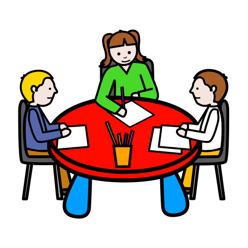 Personas sentadas alrededor de un mesa trabajando