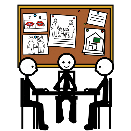 Equipo de personas sentadas en una mesa