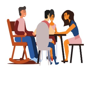 Cuatro personas alrededor de una mesa