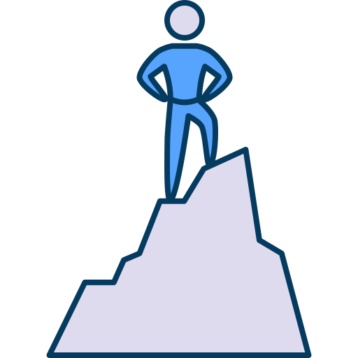 Persona llegando a la cima de la montaña