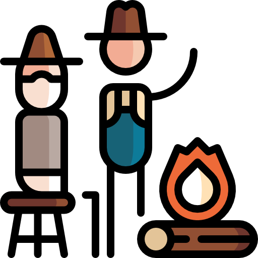 Hoguera Dos personas alrededor de una hoguera