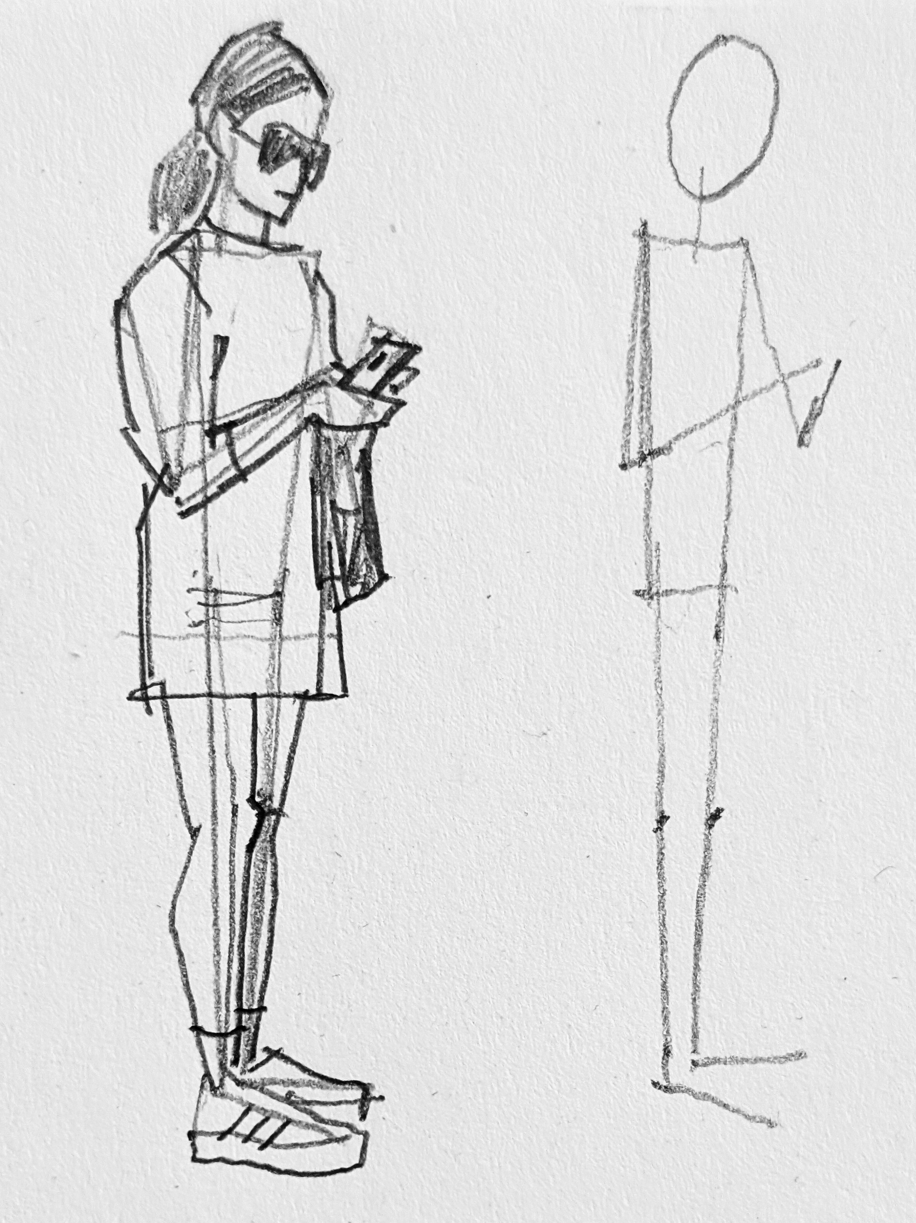 Rapaza de pé mirando o móvil e o seu esqueleto