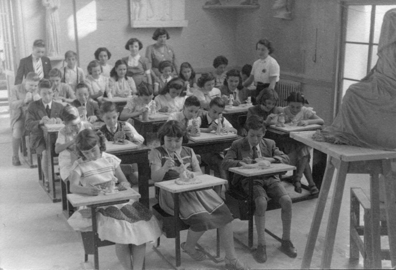 Nenos e nenas na escola Imaxe de nenos e nenas na escola en tempos pasados