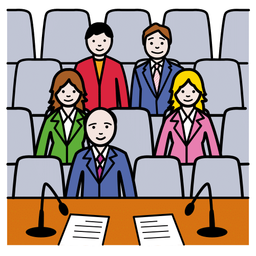 Grupo de personas en un local con butacas