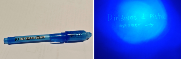 Imaxe dun bolígrafo UV e unha mensaxe escrito con el.