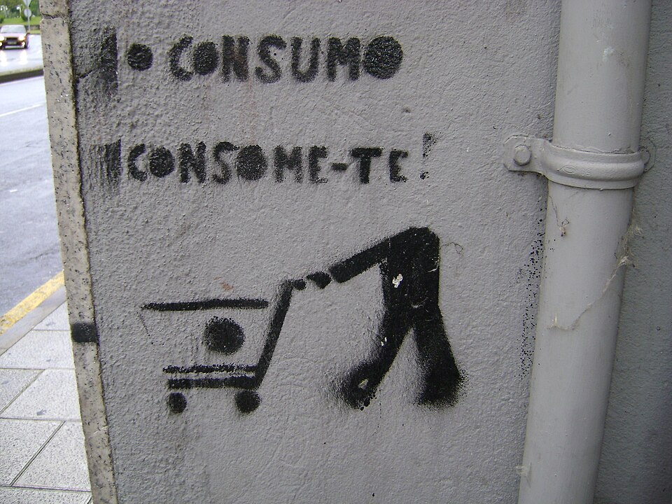 Graffiti nun mural sobre o consumismo