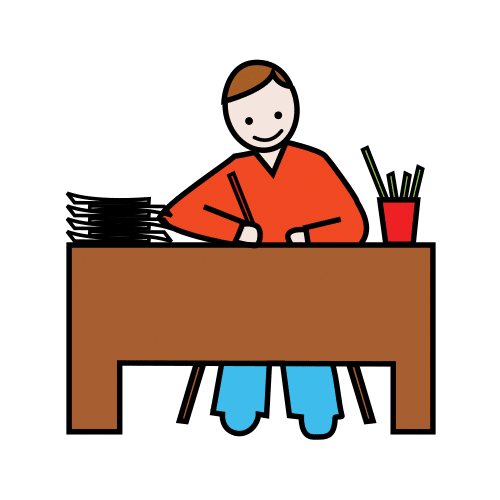 Persona trabajando en un escritorio.