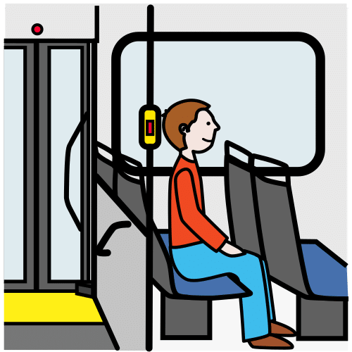 Persona sentada dentro del autobús mientras se mueve.