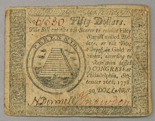 Imaxe que mostra un billete de 50$ continentais, e a súa equivalencia en reais de a oito españois.